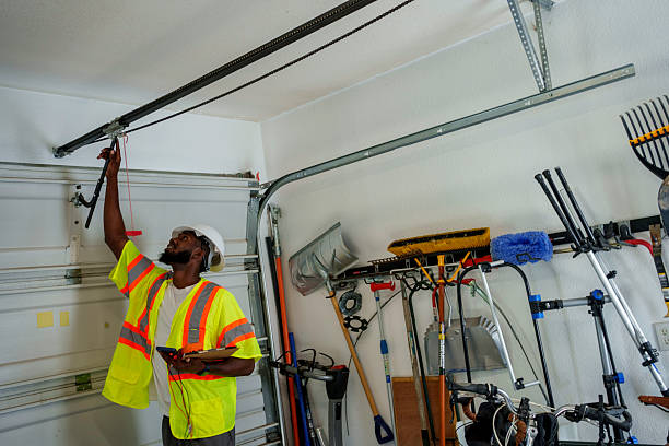 Professional Garage Door Roller Replacement technician working in St. Clairsville, OH